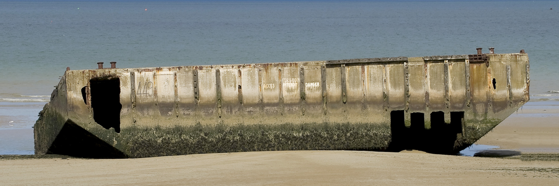 Mulberry Harbour on beach in Normandy
